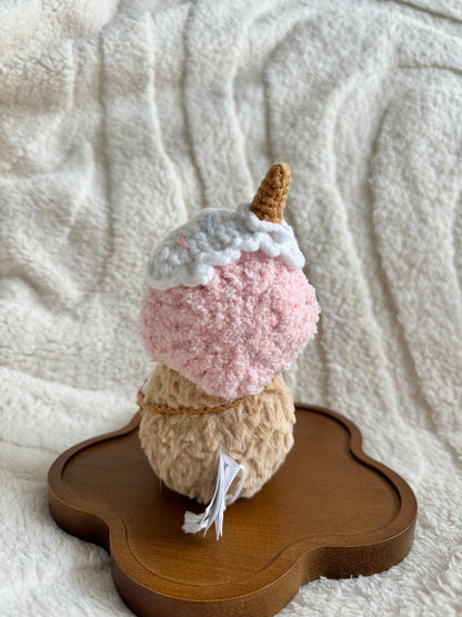 Rear view of the plush with ice cream cone hat and full back of bag visible.
