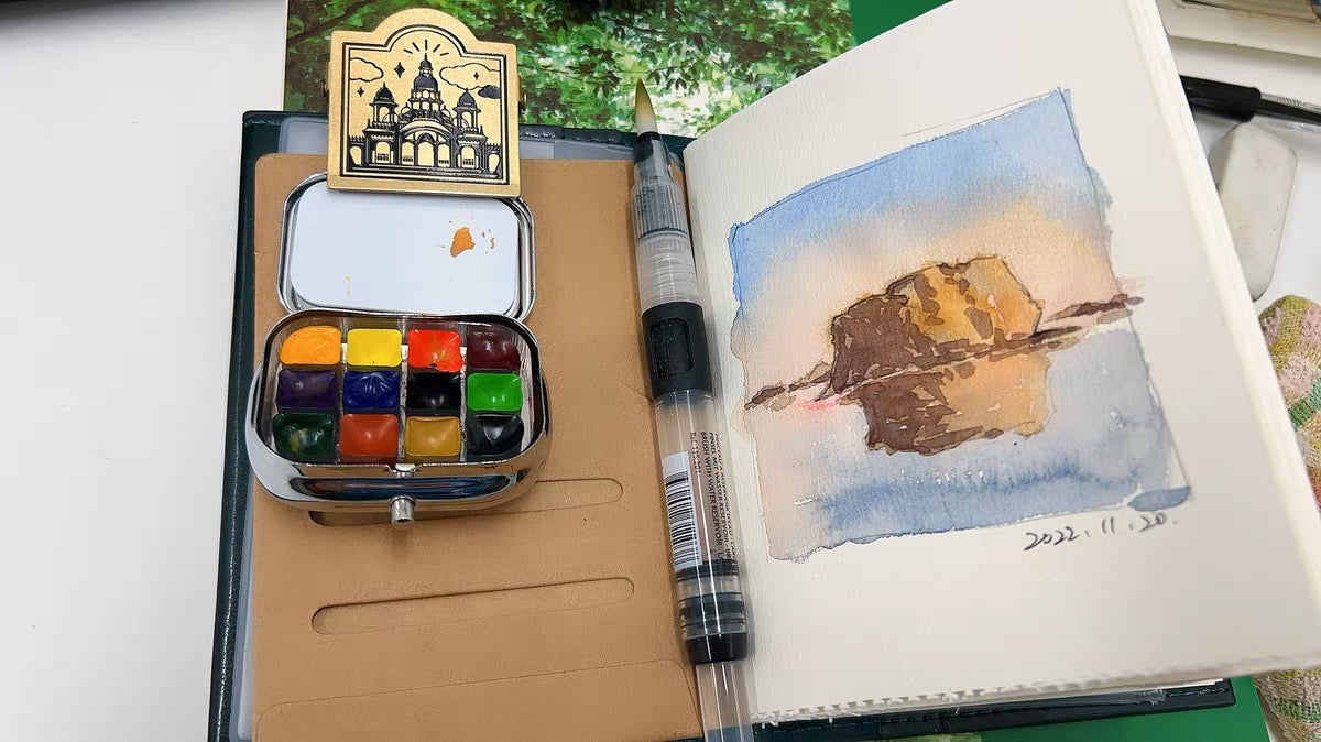 painting on the traveler's notebook